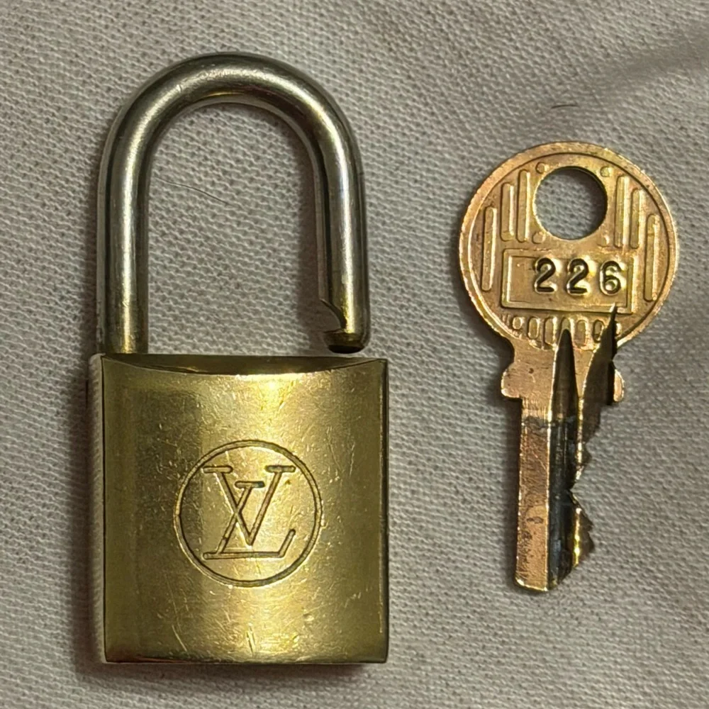 Louis Vuitton Gold Padlock with Key
